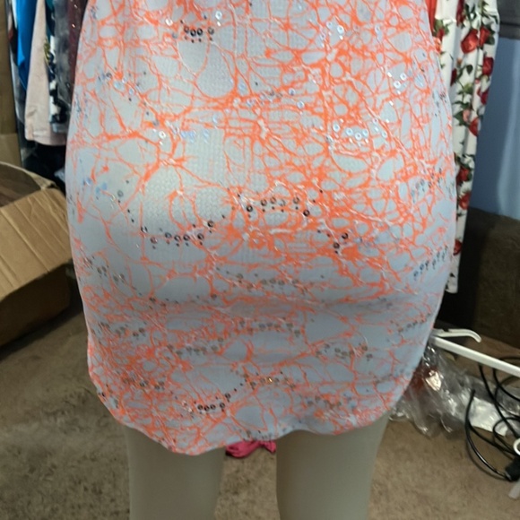 This is a mini pink party dress - Picture 4 of 7